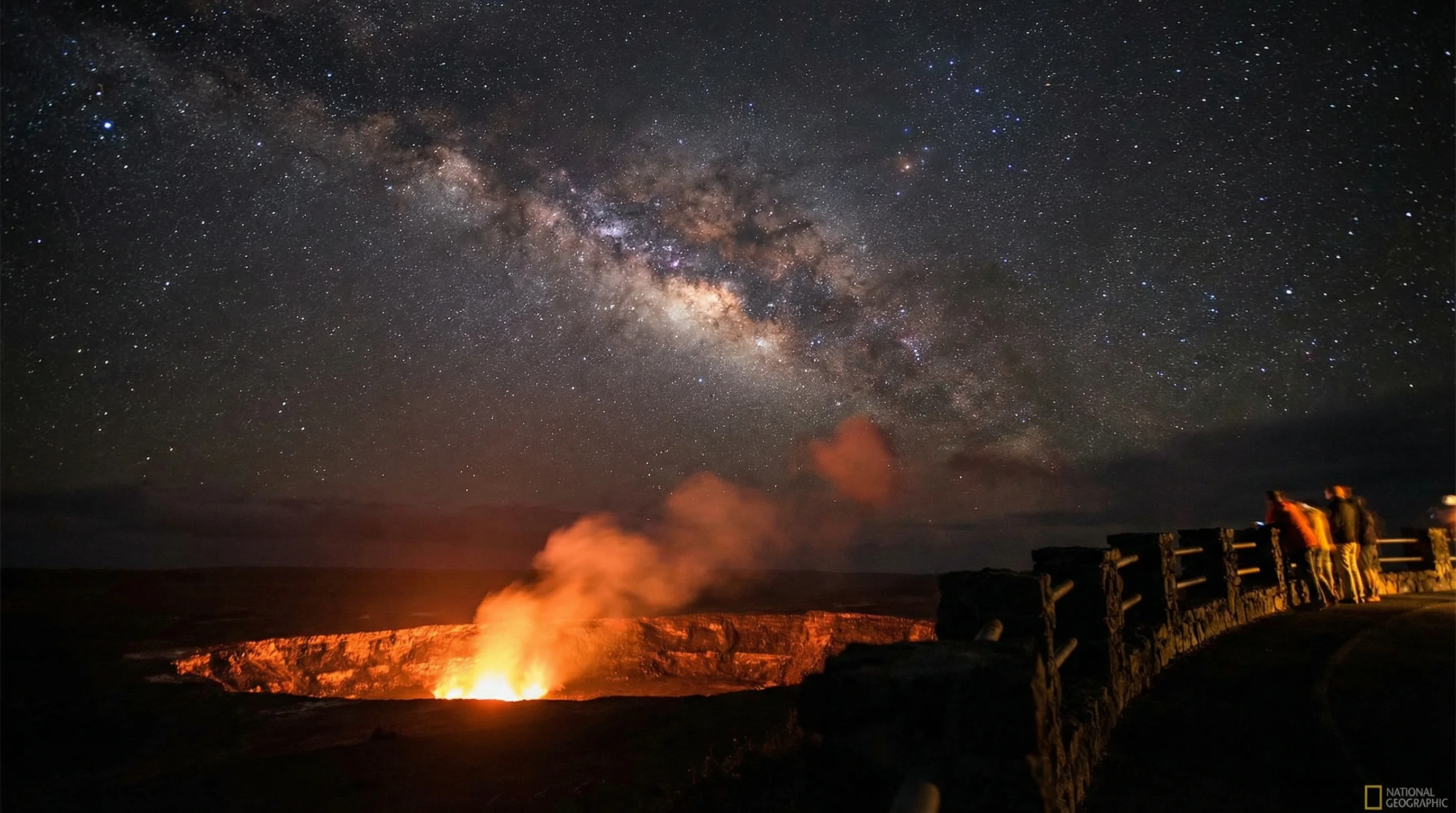 Volcano House Rim Restaurant offers unique stargazing view with glowing Halemaʻumaʻu crater under the night sky Hawaii Volcanoes National Park stargazing with Halemaumau crater glow at night